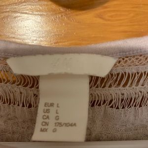 Bought new, never worn! Perfect condition, love this top but just doesn’t fit!